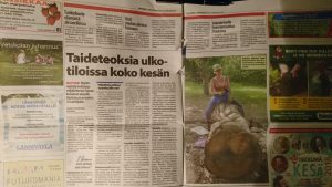 Newspaper article on the Objekti outdoor exhibition featuring Sanna Karlsson-Sutisna's environmental artwork, displayed across public spaces in Espoo.