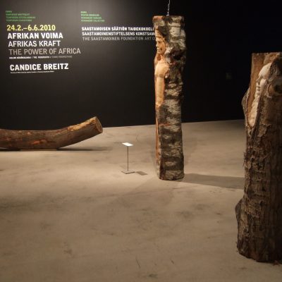 Wooden sculptures carved from tree trunks at Sanna Karlsson-Sutisna's Iroko exhibition, EMMA – Espoo Museum of Modern Art, 2010.